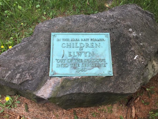 Photo of a plaque on a stone