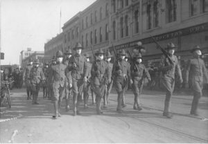 Soldiers marching in WWI victory parade